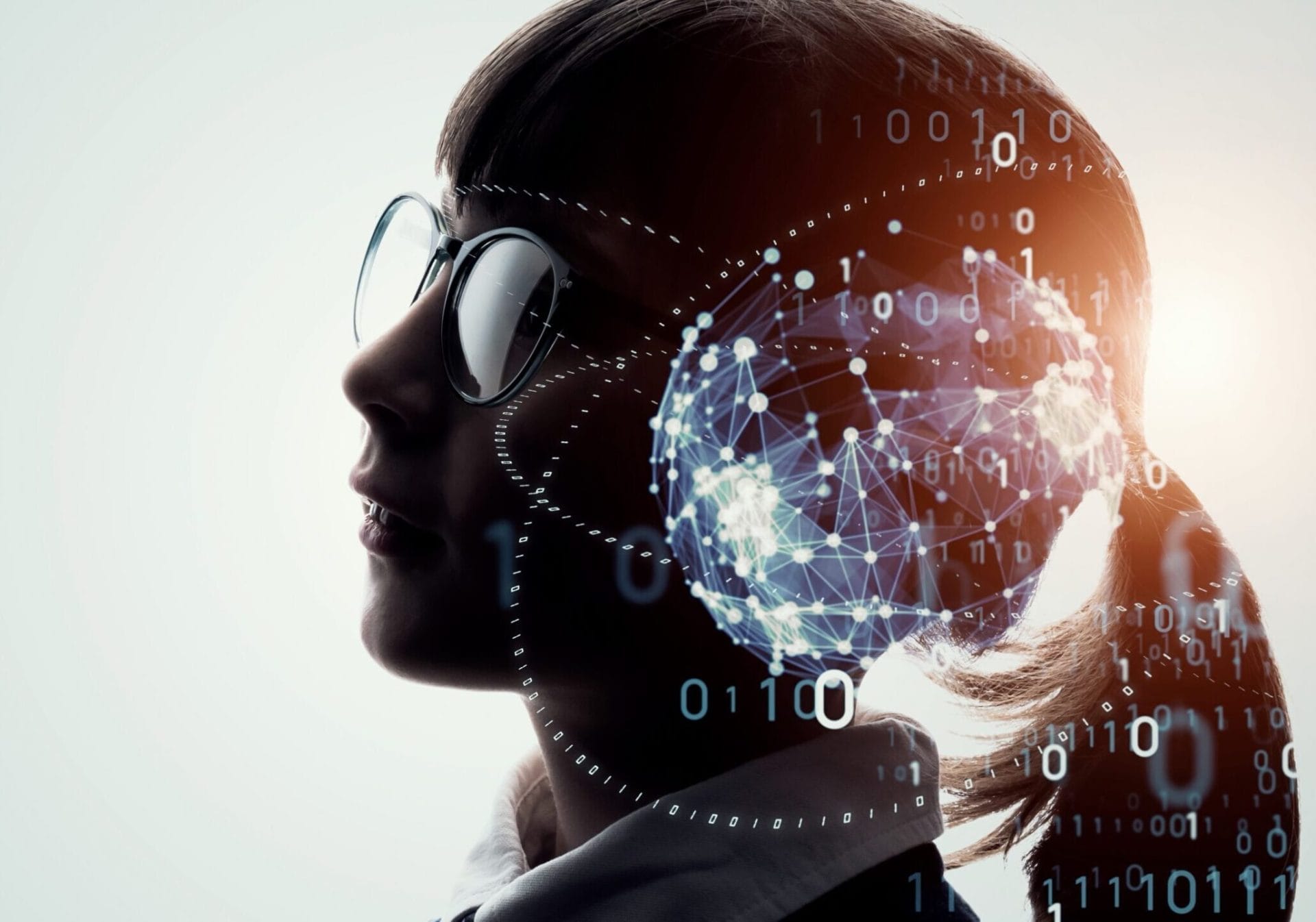 A young person with a pony tail wearing glasses. There is an image transposed over her head and brain area, consisting of lights, swirls, number codes and multiple dots joined by lines.